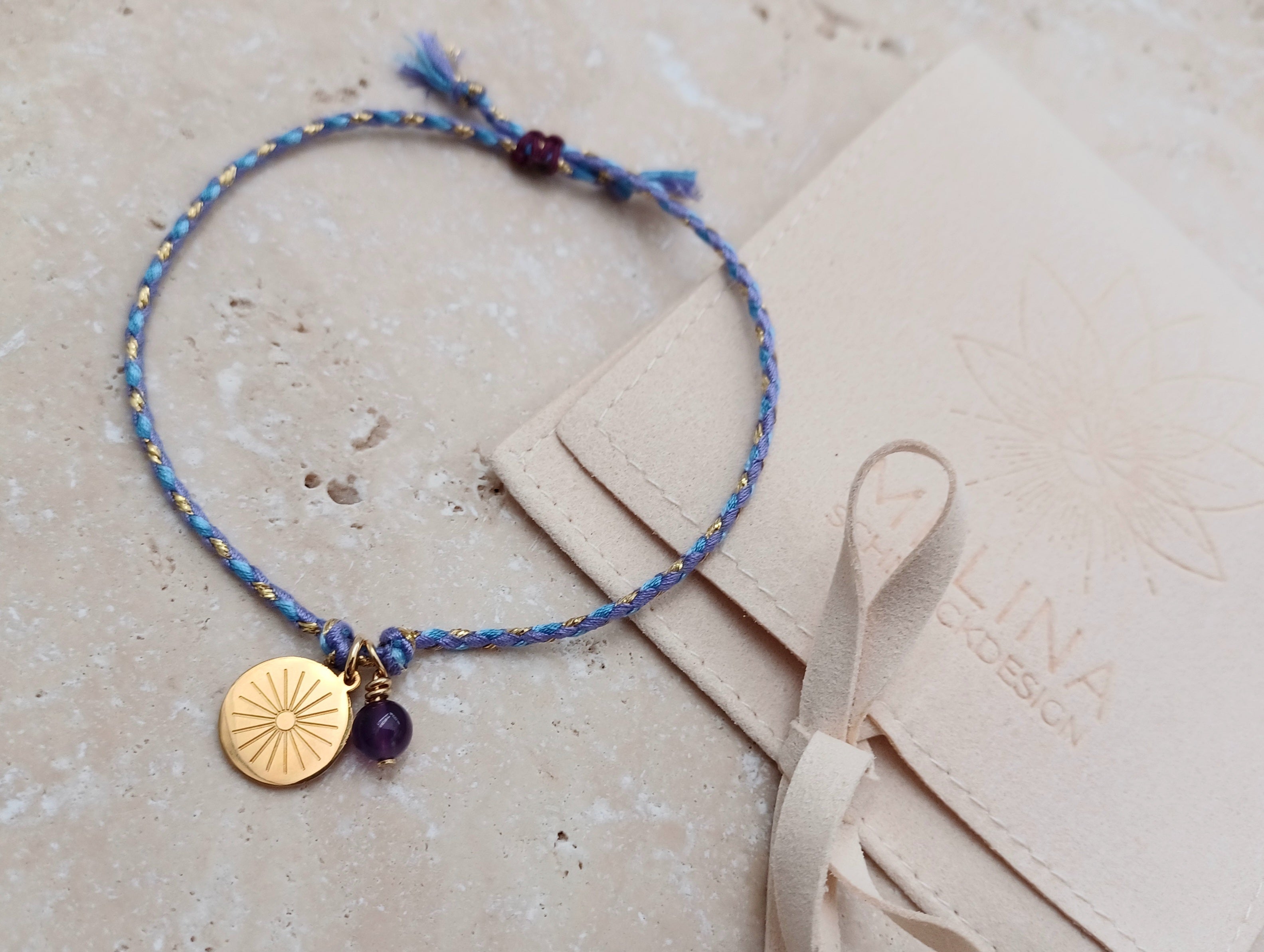 Armbändchen Sonne violett